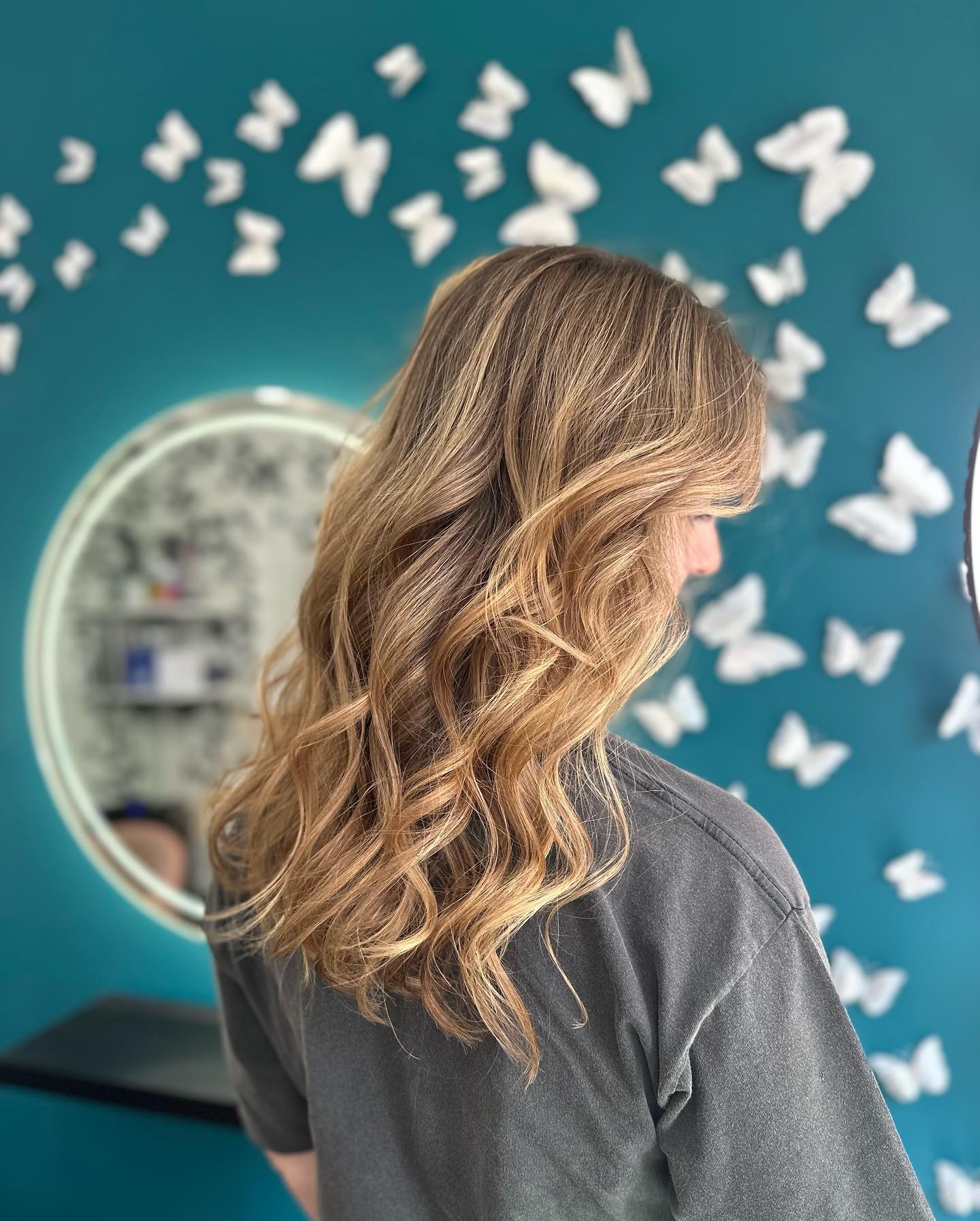 Warm caramel balayage curls